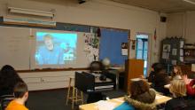 Students participate in a video conference learning session with Observatory sta