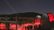 Visitors enjoying a star party at the Frank N. Bash Visitors Center at McDonald 
