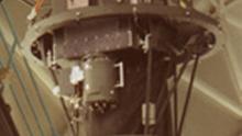 The Marcario Low-Resolution Spectrograph being mounted on the tracker above the