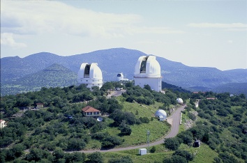 The two large domes in the foreground house the 2.1-meter (82-inch) Otto Struve 