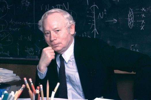 Physicist Steven Weinberg sits at desk